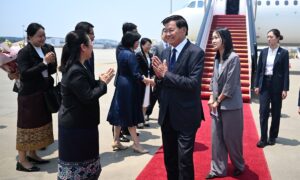 Lao top leader Thongloun arrives in China for five-day state visit